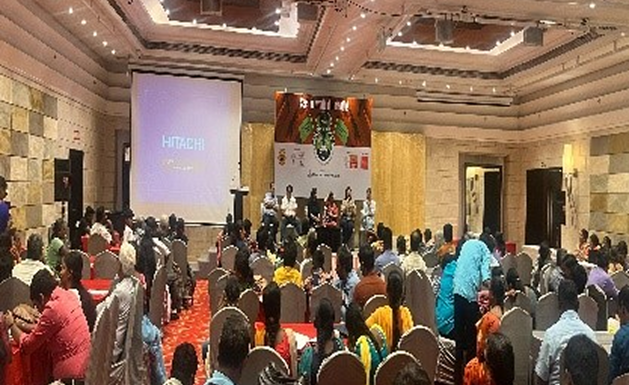 Group of blind students performing with drums in front of an audience
