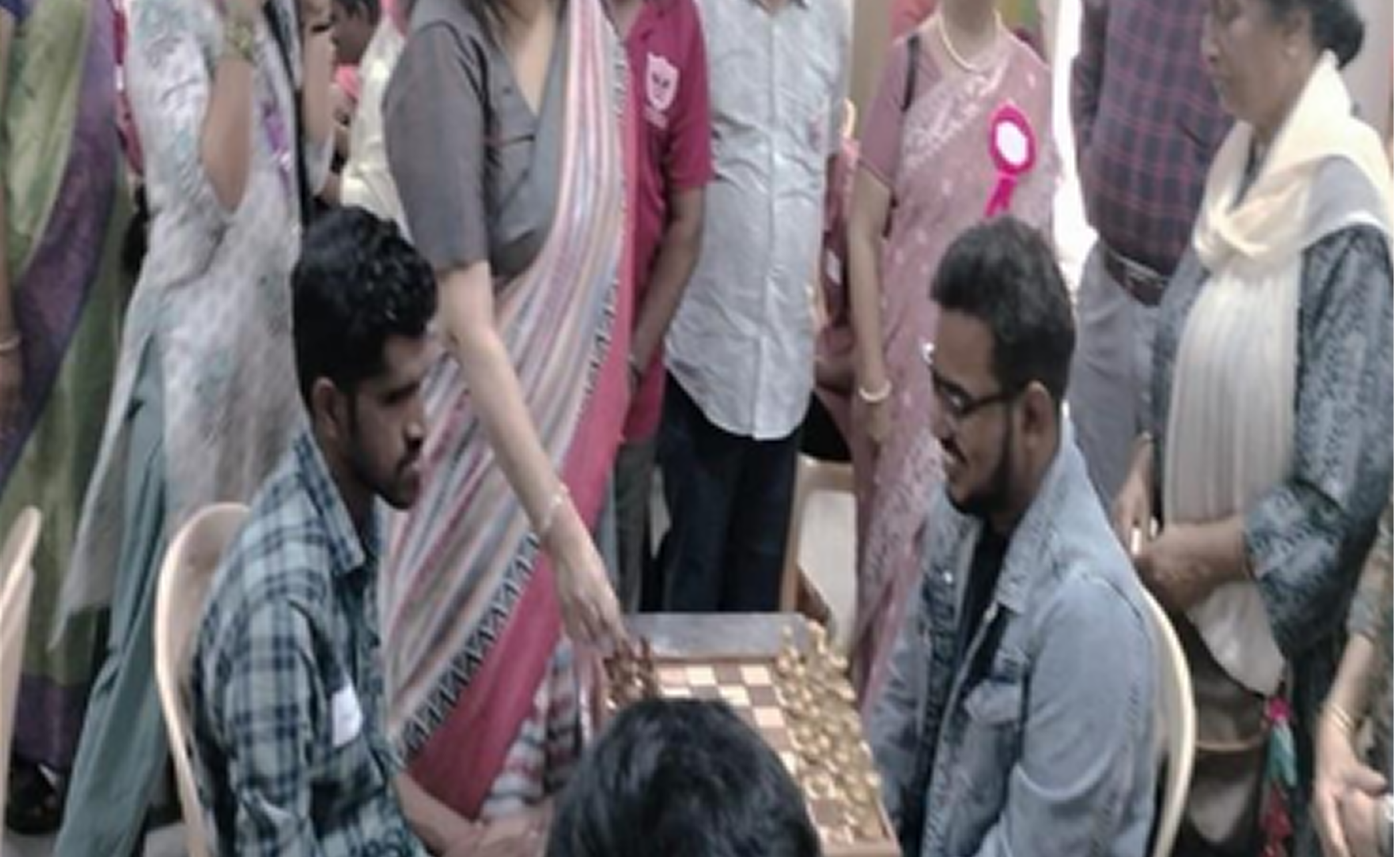 Group of blind students performing with drums in front of an audience