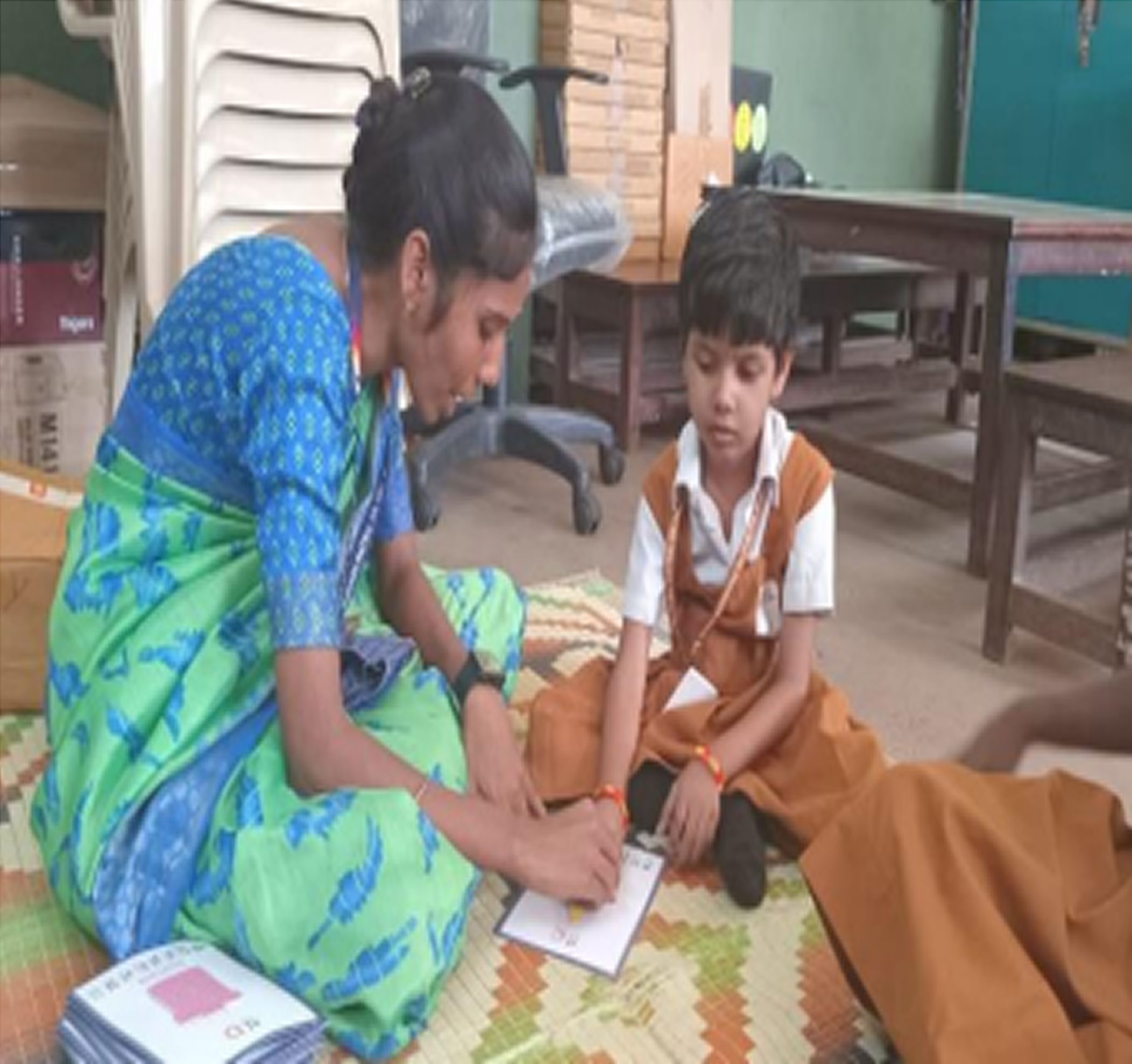Blind students learning with Braille tools in classroom